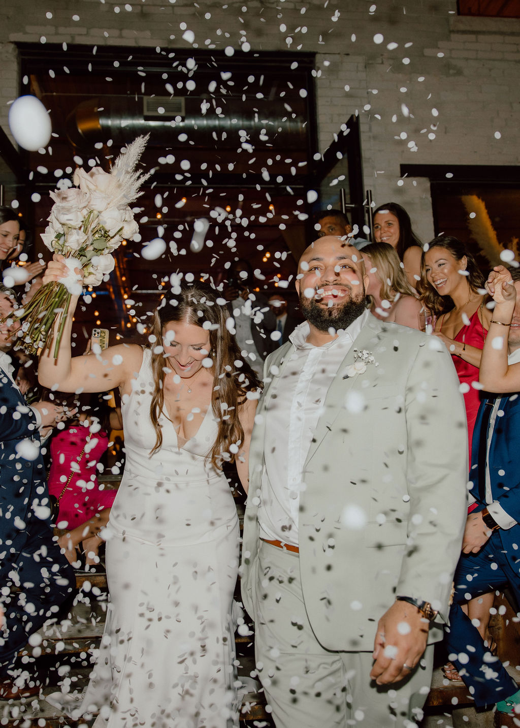 Micro wedding couple with confetti exit at Studio V Events in Toronto Ontario