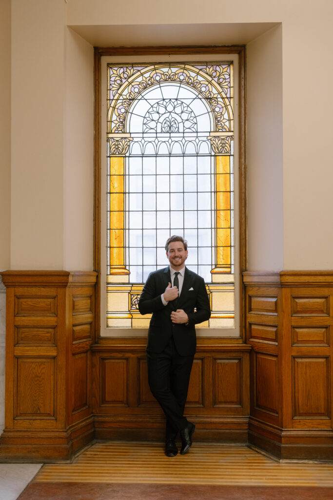 Toronto Old City Hall Civil Ceremony Groom Standing In Window