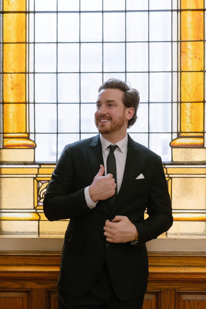 Toronto Old City Hall Civil Ceremony Groom Standing In Window