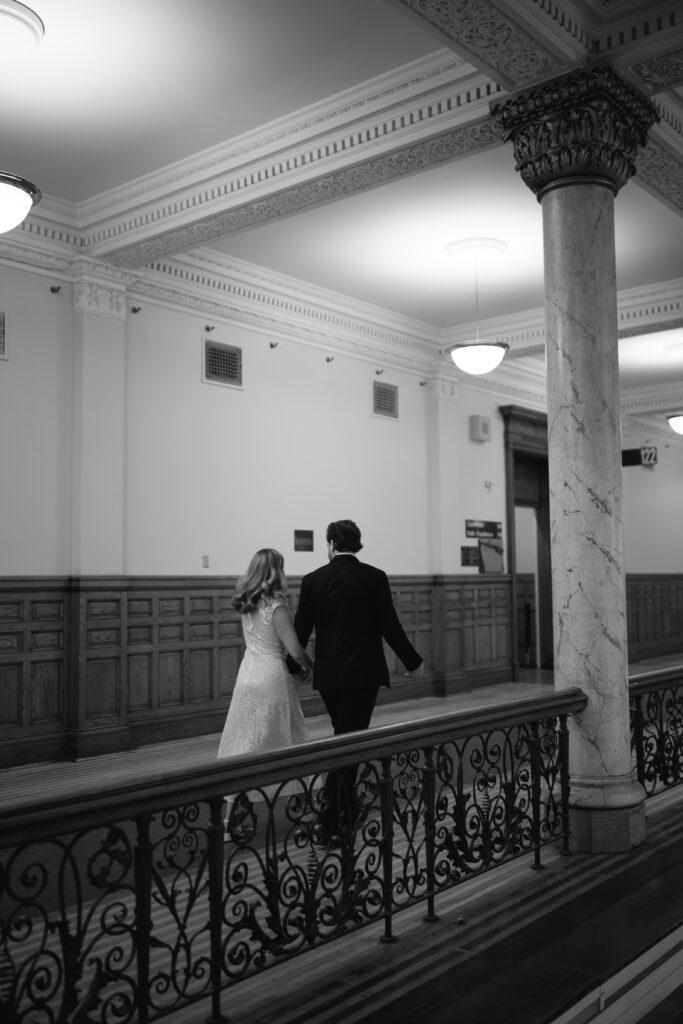 Toronto Old City Hall Civil Ceremony Couple walking away