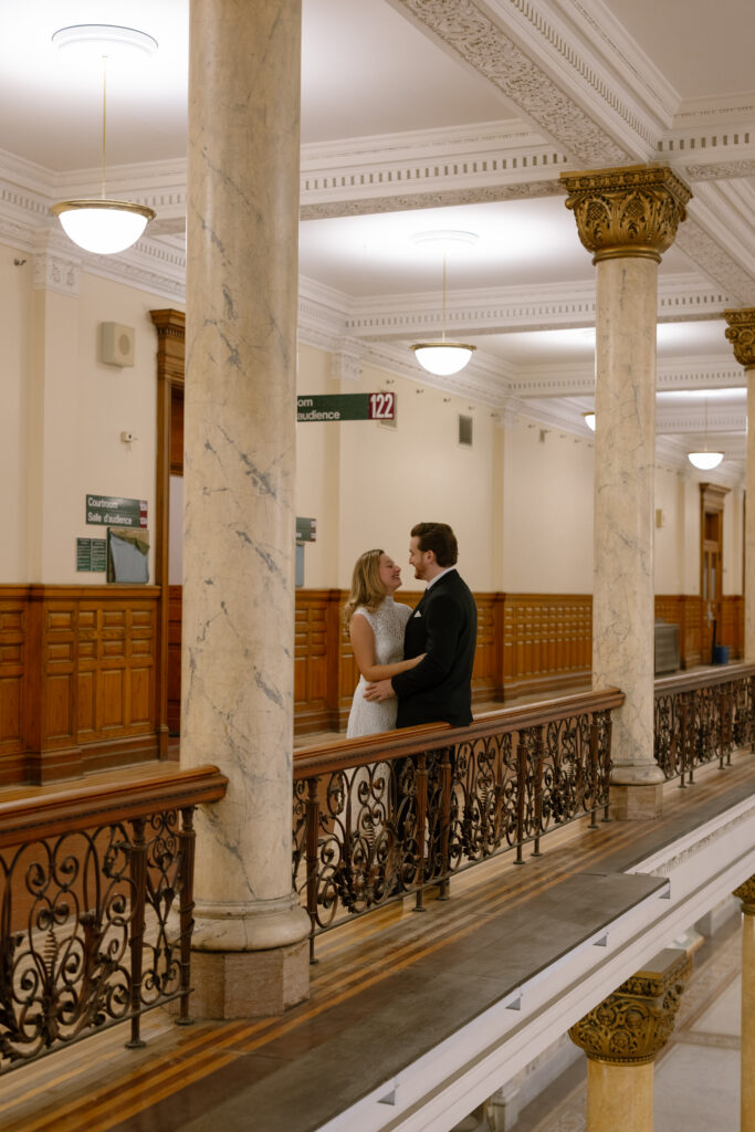 Toronto Old City Hall Civil Ceremony Couple standing in hallway