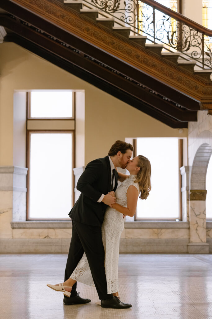 Toronto Old City Hall Civil Ceremony Couple dip kissing
