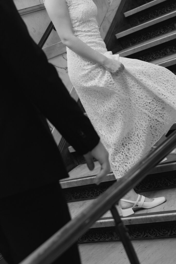 Toronto Old City Hall Civil Ceremony Couple close up of bride holding her dress