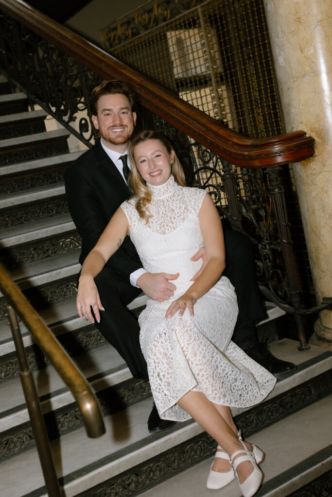 Toronto Old City Hall Civil Ceremony Couple sitting on stairs