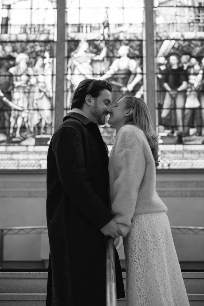 Toronto Old City Hall Civil Ceremony Couple standing leaning over railing