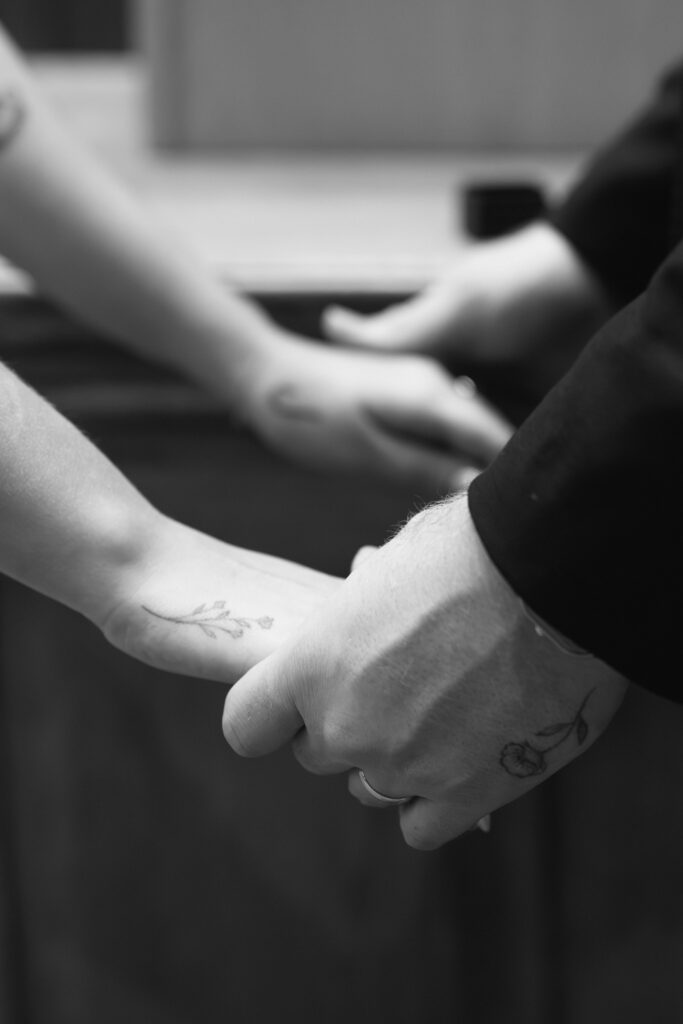 Toronto Old City Hall Civil Ceremony Couple holding hands