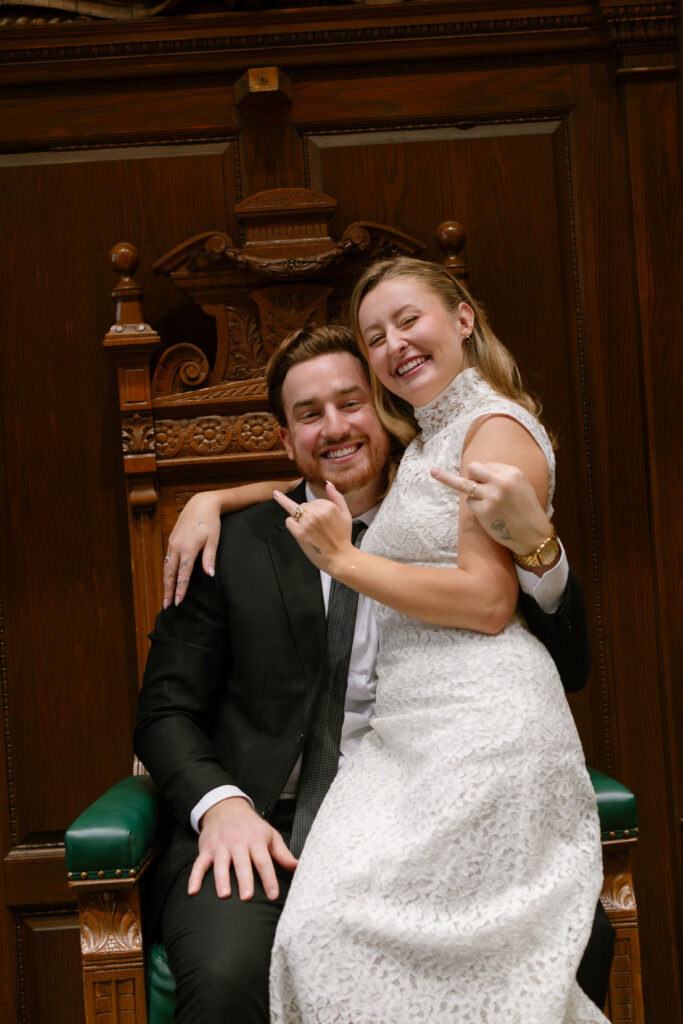 Toronto Old City Hall Civil Ceremony Couple showing off rings