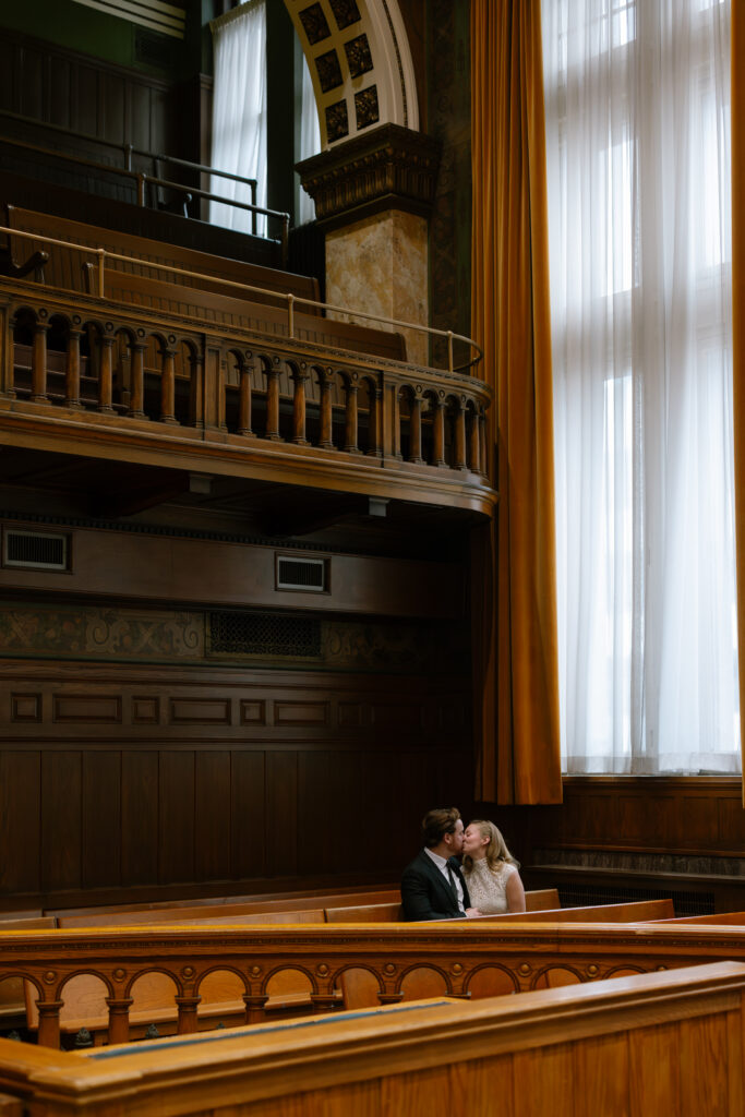 Toronto Old City Hall Civil Ceremony Couple sitting in alter