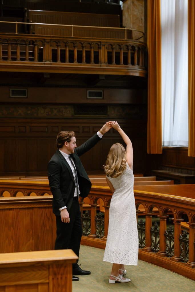 Toronto Old City Hall Civil Ceremony Couple twirling