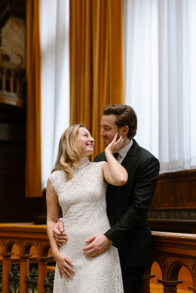 Toronto Old City Hall Civil Ceremony Couple looking at each other in chamber