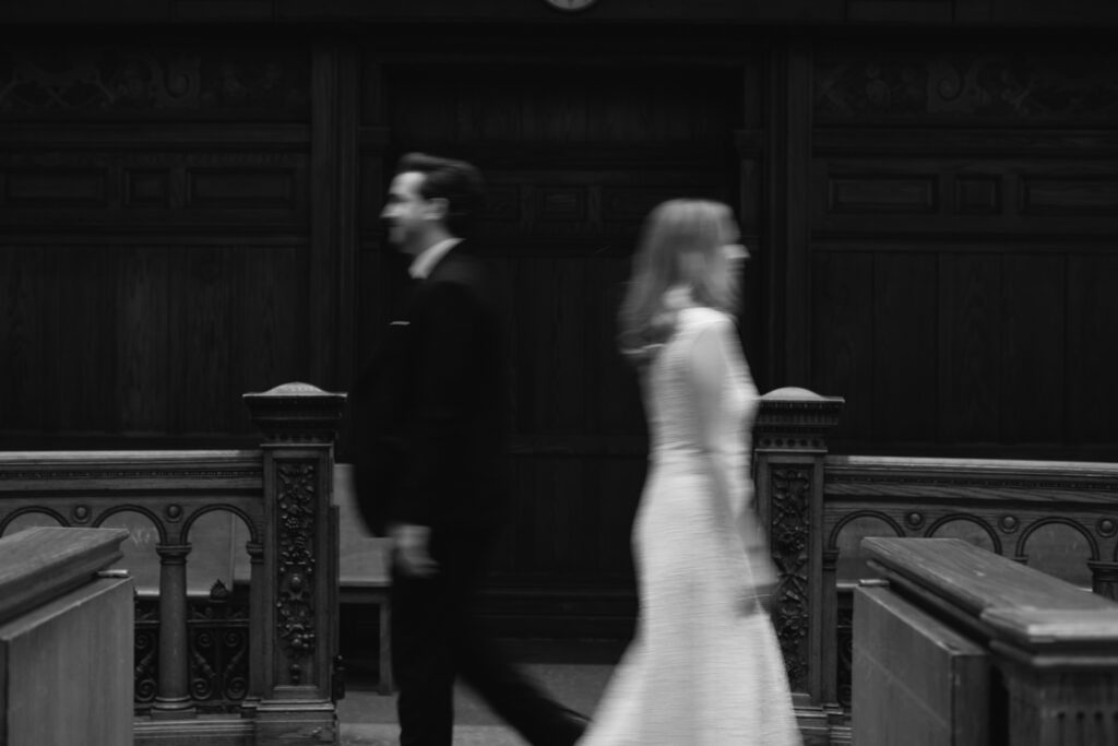 Toronto Old City Hall Civil Ceremony Couple blurred walking