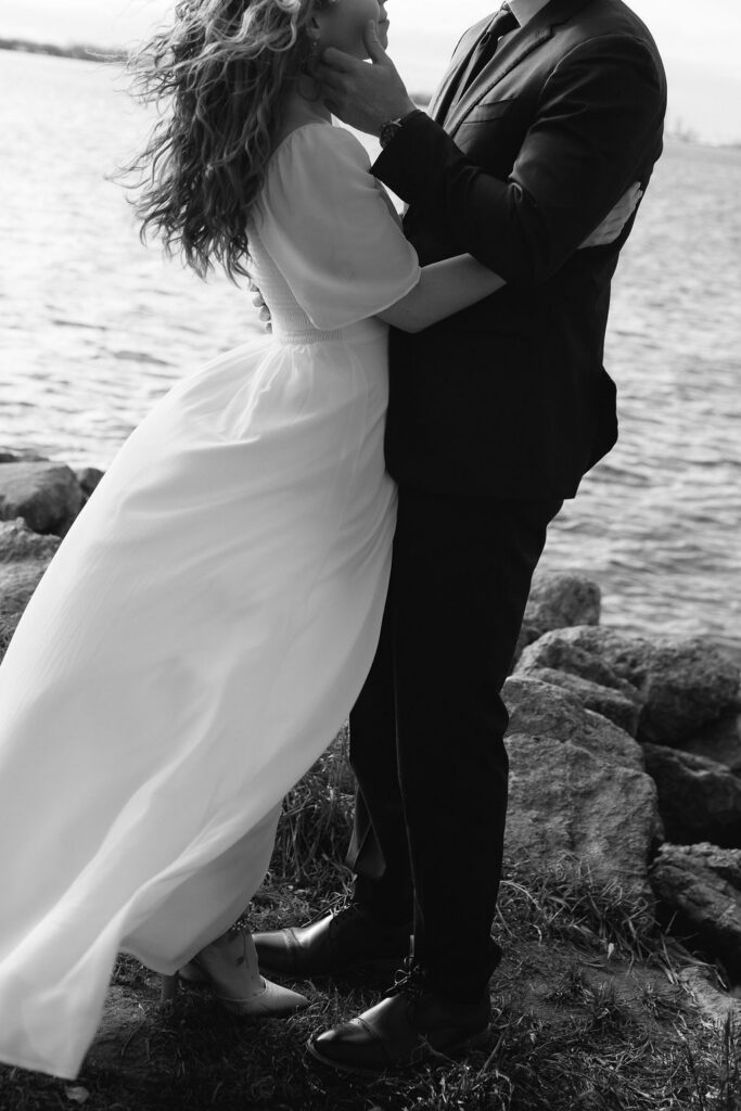 Toronto Island proposal couple dress blowing in wind